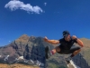 Donovan jumping for joy in Glacier National Park